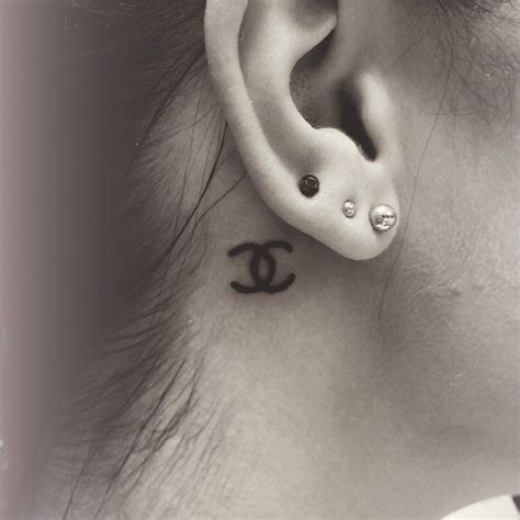 chanel tattoo behind ear|ear tails tattoo.